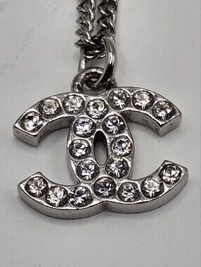 #1109 - Chanel Coco Mark F2012W Necklace with GP/Rhinestones Color: Silver