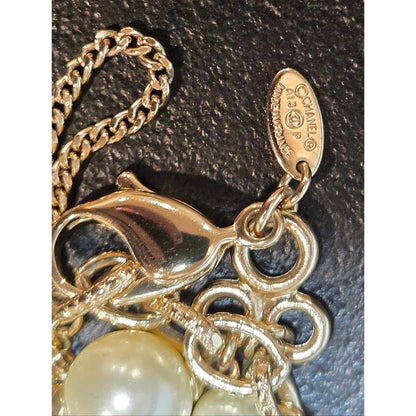 #184 - CHANEL Camellia Faux Pearl Necklace 2013