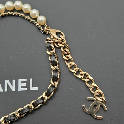 #112 Chanel Coco Mark, Matelasse Bag Motif, Faux Pearl, and Leather - B21SAB6125