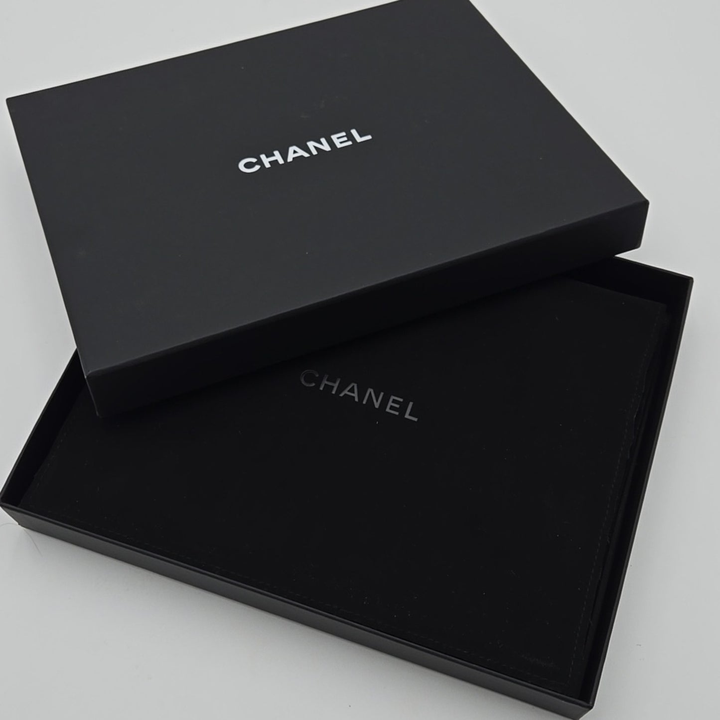 #112 Chanel Coco Mark, Matelasse Bag Motif, Faux Pearl, and Leather - B21SAB6125