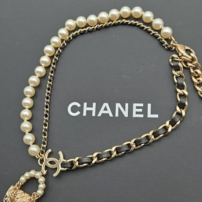 #112 Chanel Coco Mark, Matelasse Bag Motif, Faux Pearl, and Leather - B21SAB6125