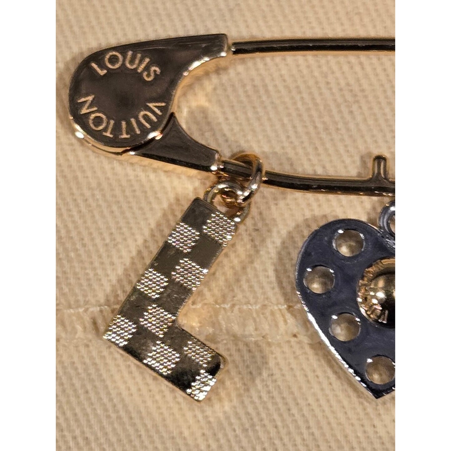 #135 - Louis Vuitton Brooch LOVE Safety Pin Motif M67035
