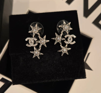 #147 CHANEL Star CC Earrings Silver, 2016 pierced - AUTHENTIC CHANEL