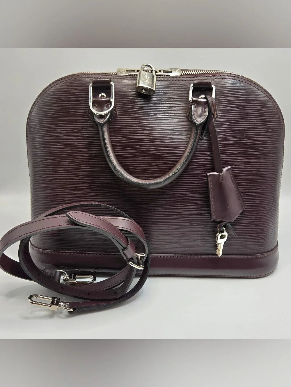Louis Vuitton Epi Alma M5214D FL0124 Brown Lock and secure Cadena