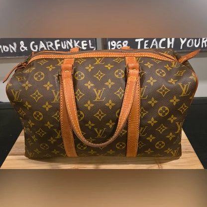 Louis Vuitton Brown Monogram Saxe Souple 35