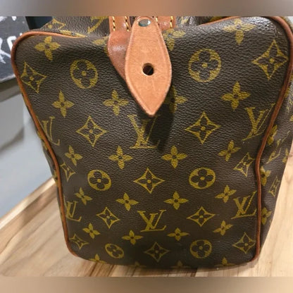 Louis Vuitton Brown Monogram Saxe Souple 35