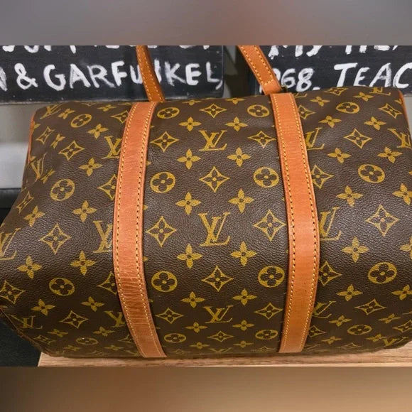 Louis Vuitton Brown Monogram Saxe Souple 35