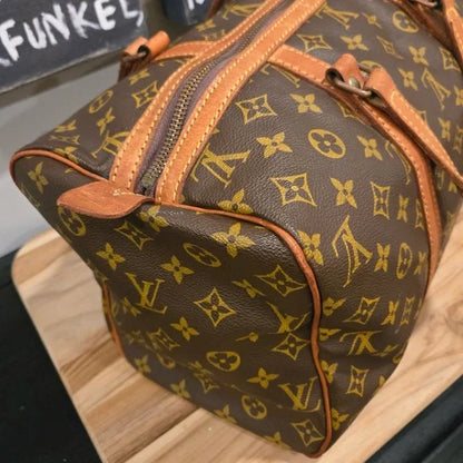 Louis Vuitton Brown Monogram Saxe Souple 35