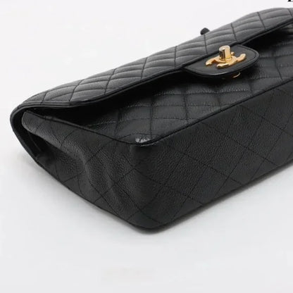 Chanel Quilted Caviar Double Flap Bag - Medium / 25