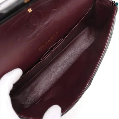 Chanel Quilted Caviar Double Flap Bag - Medium / 25