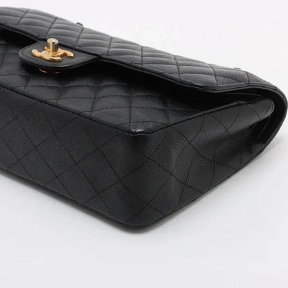Chanel Quilted Caviar Double Flap Bag - Medium / 25