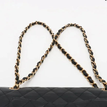 Chanel Quilted Caviar Double Flap Bag - Medium / 25