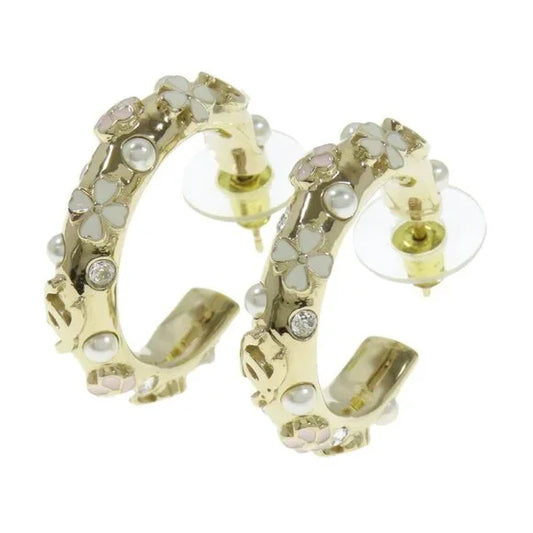 #109 Chanel hoop earrings with a Flower Motif