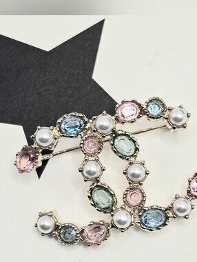 #165 - Chanel CC Brooch