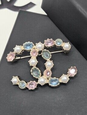 #165 - Chanel CC Brooch