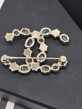 #165 - Chanel CC Brooch