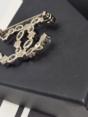 #165 - Chanel CC Brooch