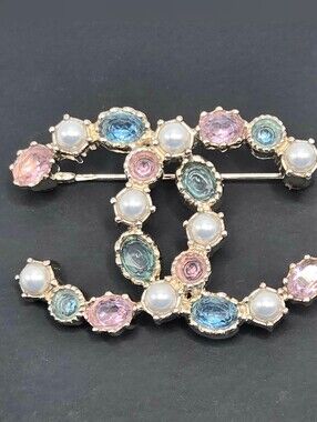 #165 - Chanel CC Brooch