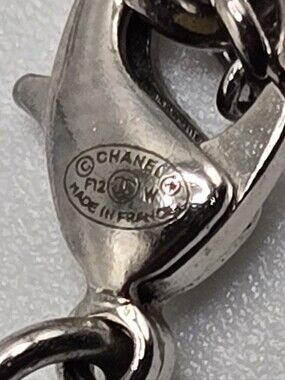 #1109 - Chanel Coco Mark F2012W Necklace with GP/Rhinestones Color: Silver