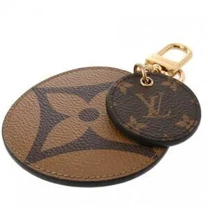 Louis Vuitton Monogram Giant Reverse Illustre Bag Charm Brown M69317
