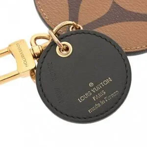 Louis Vuitton Monogram Giant Reverse Illustre Bag Charm Brown M69317