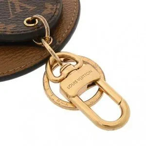 Louis Vuitton Monogram Giant Reverse Illustre Bag Charm Brown M69317