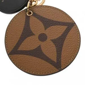 Louis Vuitton Monogram Giant Reverse Illustre Bag Charm Brown M69317