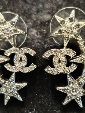 #147 CHANEL Star CC Earrings Silver, 2016 pierced - AUTHENTIC CHANEL