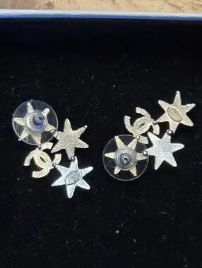 #147 CHANEL Star CC Earrings Silver, 2016 pierced - AUTHENTIC CHANEL