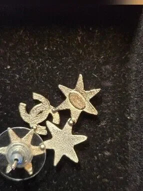 #147 CHANEL Star CC Earrings Silver, 2016 pierced - AUTHENTIC CHANEL