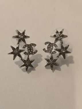 #147 CHANEL Star CC Earrings Silver, 2016 pierced - AUTHENTIC CHANEL