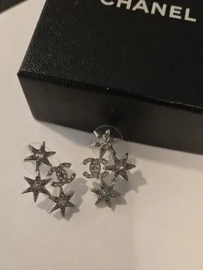 #147 CHANEL Star CC Earrings Silver, 2016 pierced - AUTHENTIC CHANEL