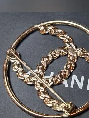 #162 - Chanel 2019 Golden Tone CC Logo w/crystals Brooch