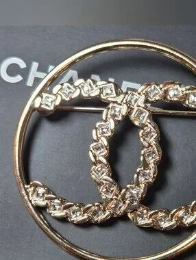 #162 - Chanel 2019 Golden Tone CC Logo w/crystals Brooch