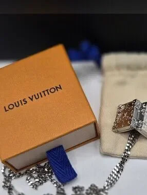 131 - LOUIS VUITTON M00527 Monogram LV Trunk Charm Pendant